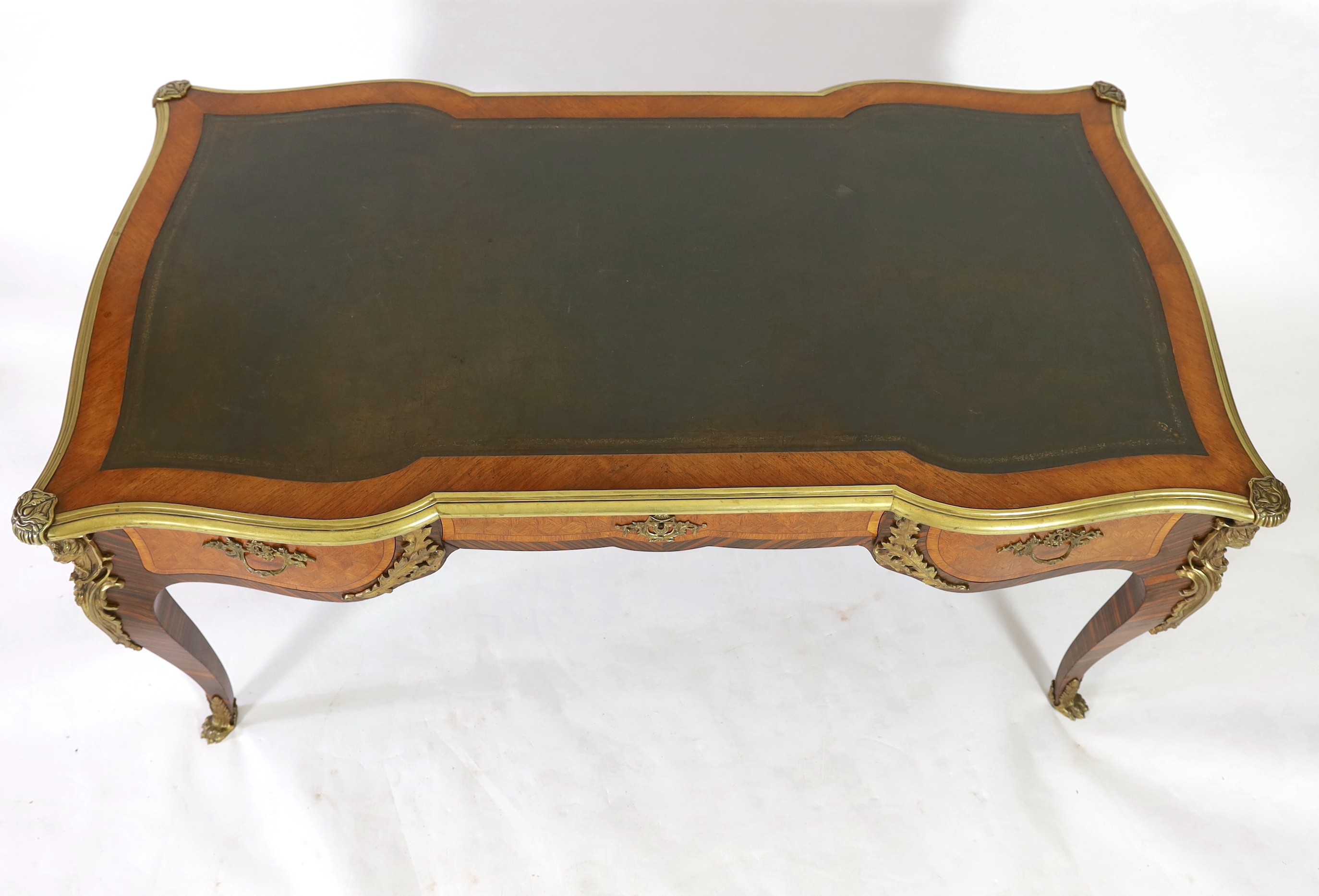 A Louis XVI style kingwood and parquetry bureau plat 166 x 90cm. Height 78cm.
